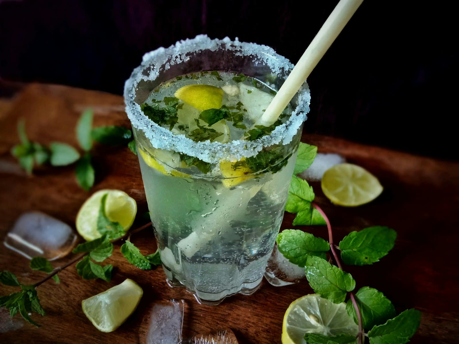 An iced mojito with lime and fresh mint